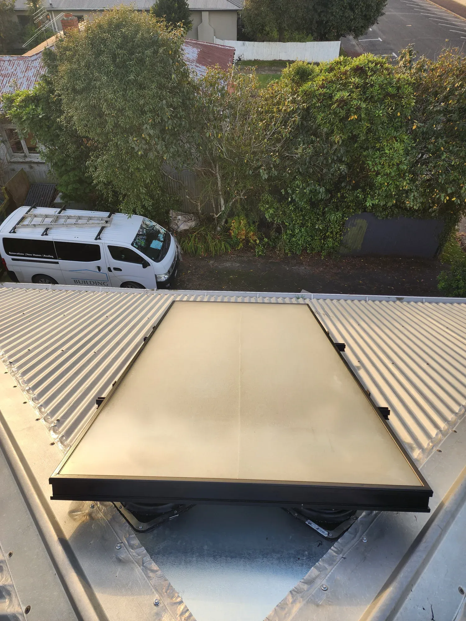 Tempered glass solar air panel on a coloursteel roof