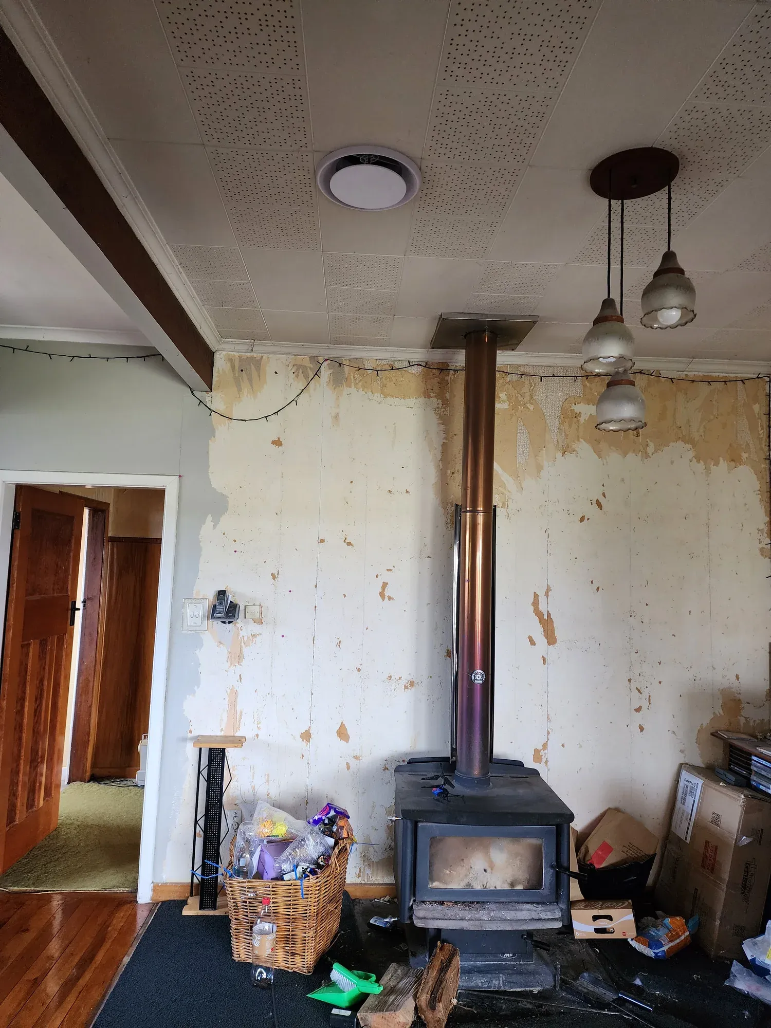 Heat transfer intake fitted near a wood burner