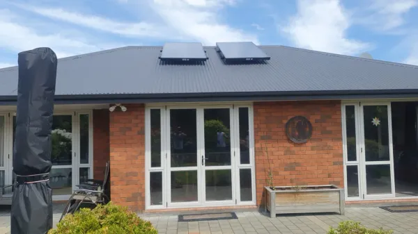 Solar air panel fitted to a light coloursteel roof pitch