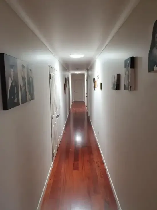 The same hallway lit by a sun tube